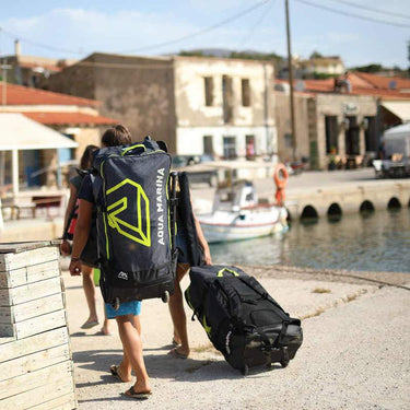 Traveller with Aqua Marina Rolling Luggage Backpack